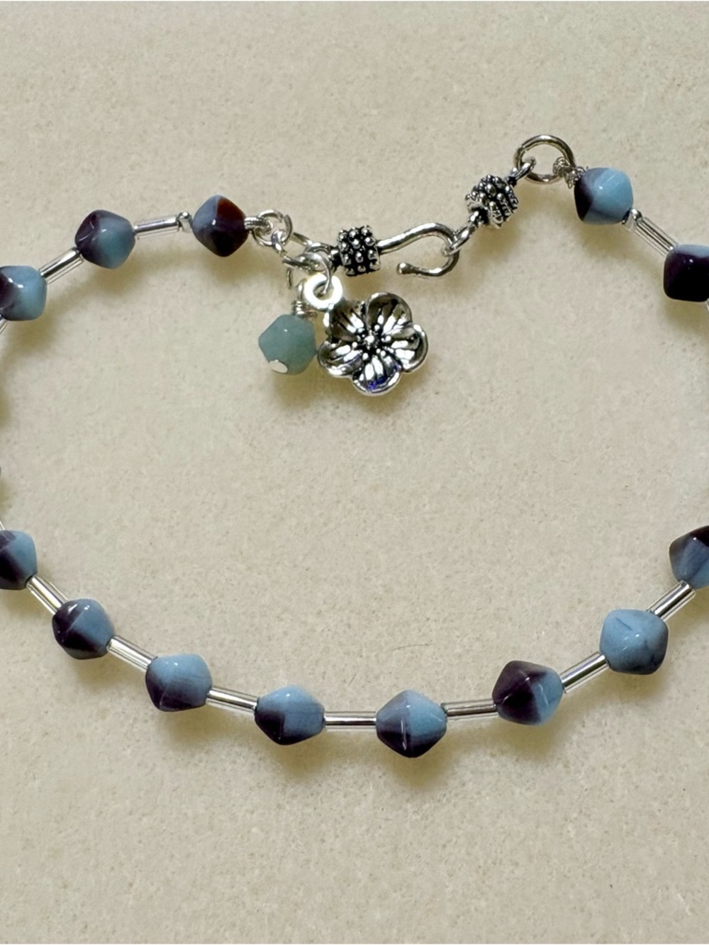 Blue & Purple Beaded Bracelet with Silver Flower Charm